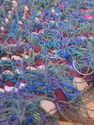 Lilla, roosa ja sinisekirju narmaskoega kaltsuvaip
